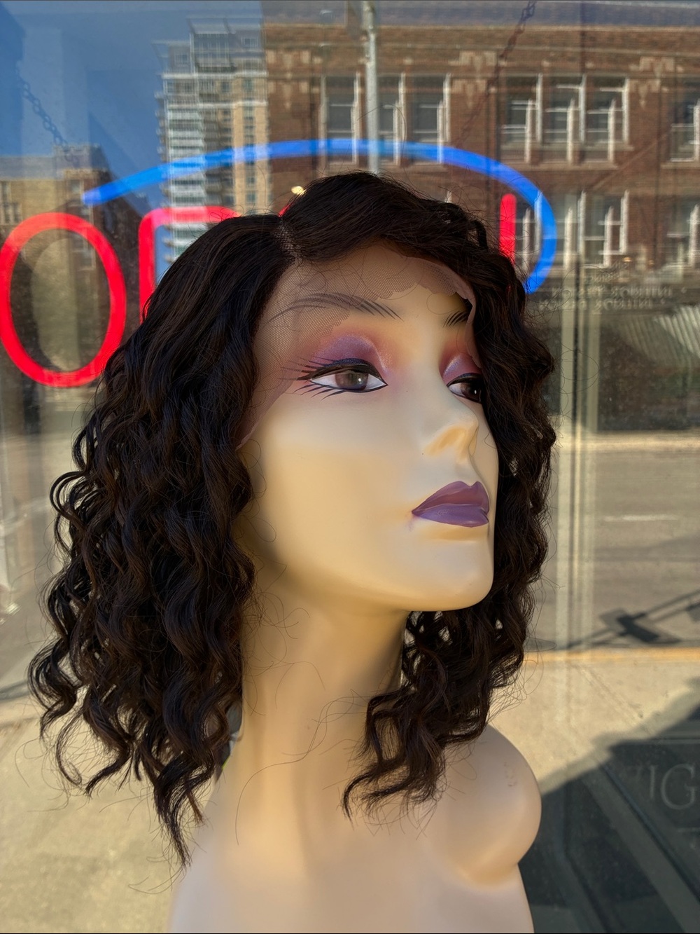 Brown curly lace front wig with subtle highlights
